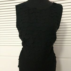 Black sleeveless scallop blouse